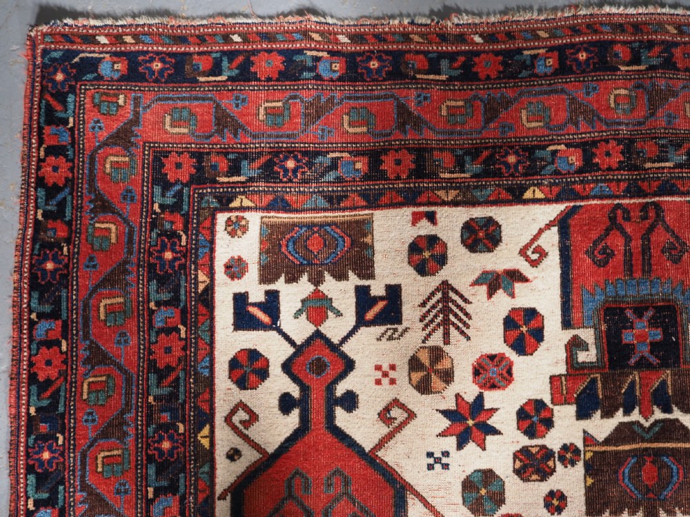 ANTIQUE AFSHAR NERIZ RUG WITH SHIELD DESIGN, CIRCA 1900. View V