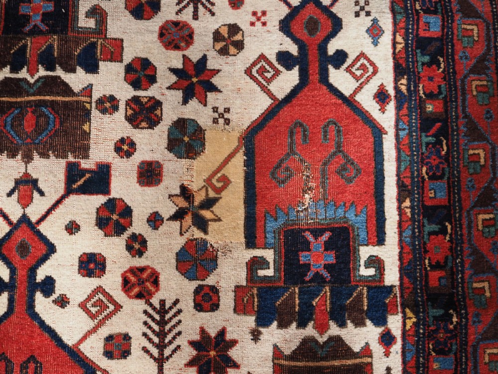 ANTIQUE AFSHAR NERIZ RUG WITH SHIELD DESIGN, CIRCA 1900. View X