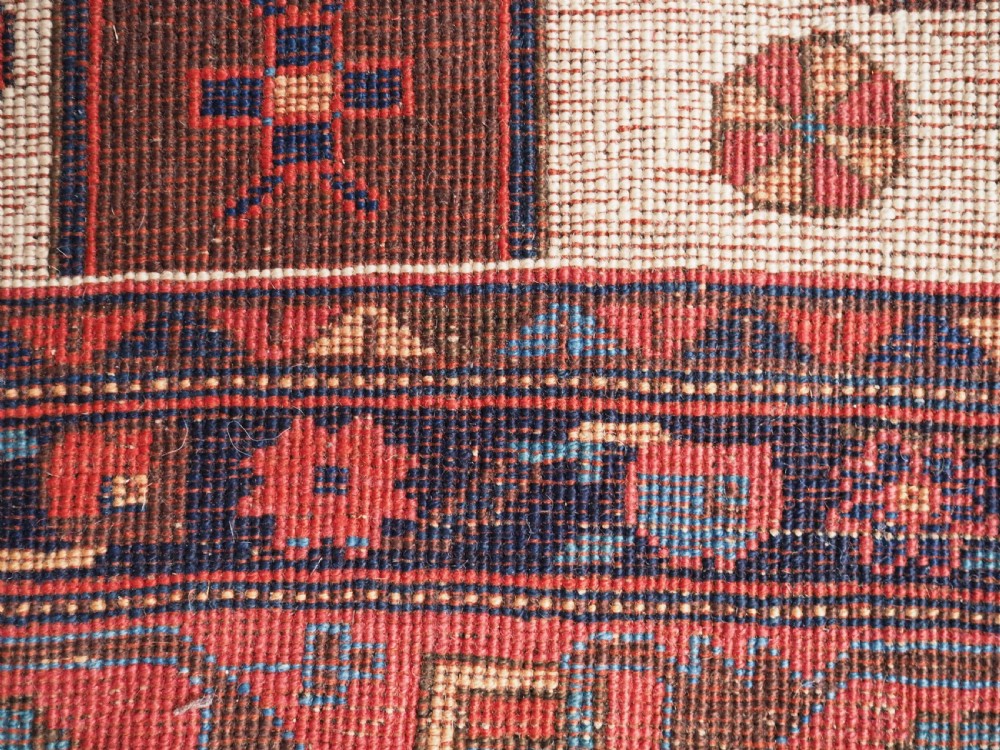 ANTIQUE AFSHAR NERIZ RUG WITH SHIELD DESIGN, CIRCA 1900. View XI