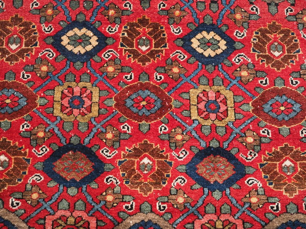 ANTIQUE BAKHTIARI RUG WITH MINA KHANI DESIGN, CIRCA 1900. View X