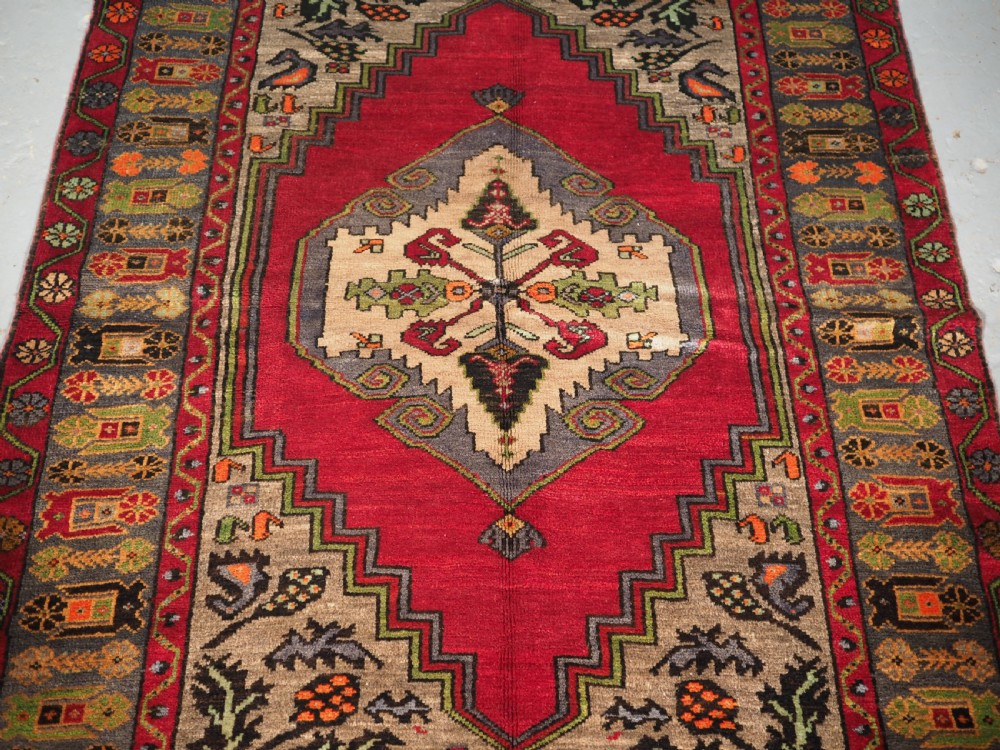 OLD CENTRAL ANATOLIAN TURKISH VILLAGE RUG, SINGLE MEDALLION, CIRCA 1930. View IV