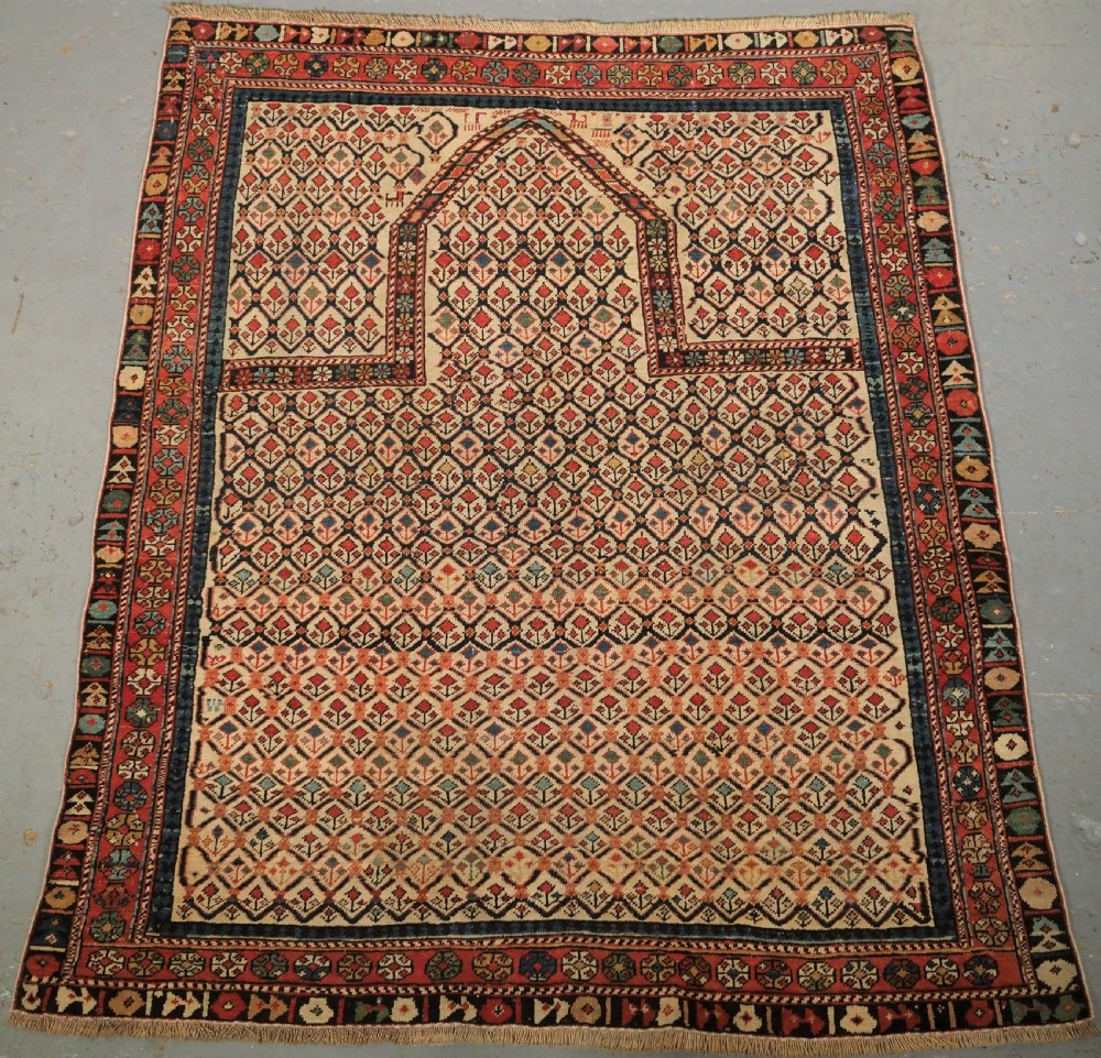 ANTIQUE CAUCASIAN SHIRVAN FLORAL LATTICE PRAYER RUG, CIRCA 1890.
