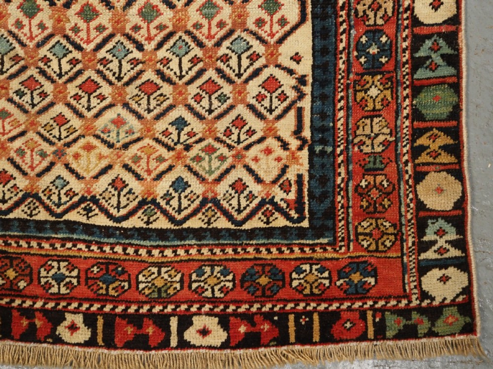 ANTIQUE CAUCASIAN SHIRVAN FLORAL LATTICE PRAYER RUG, CIRCA 1890. View X