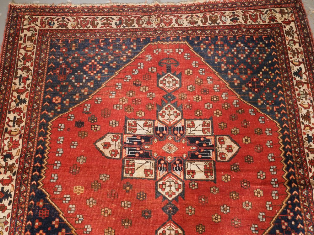 ANTIQUE AFSHAR RUG, SINGLE MEDALLION DESIGN, CIRCA 1900. View II