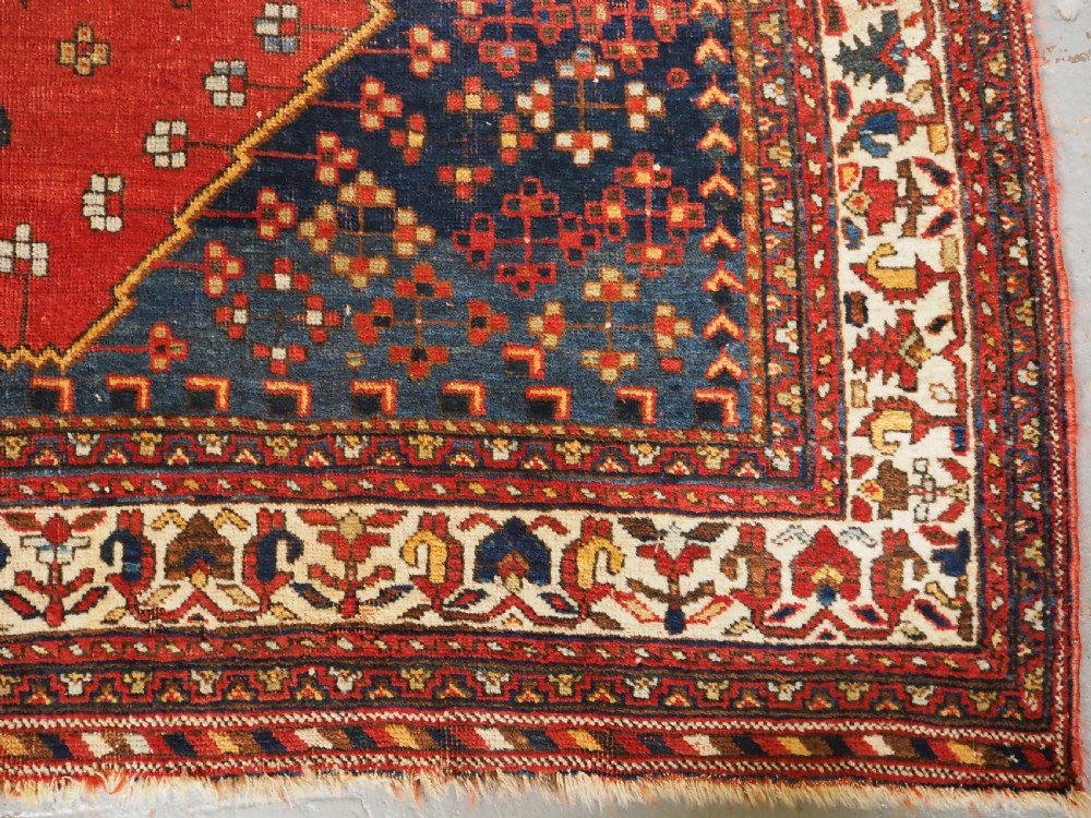ANTIQUE AFSHAR RUG, SINGLE MEDALLION DESIGN, CIRCA 1900. View XI