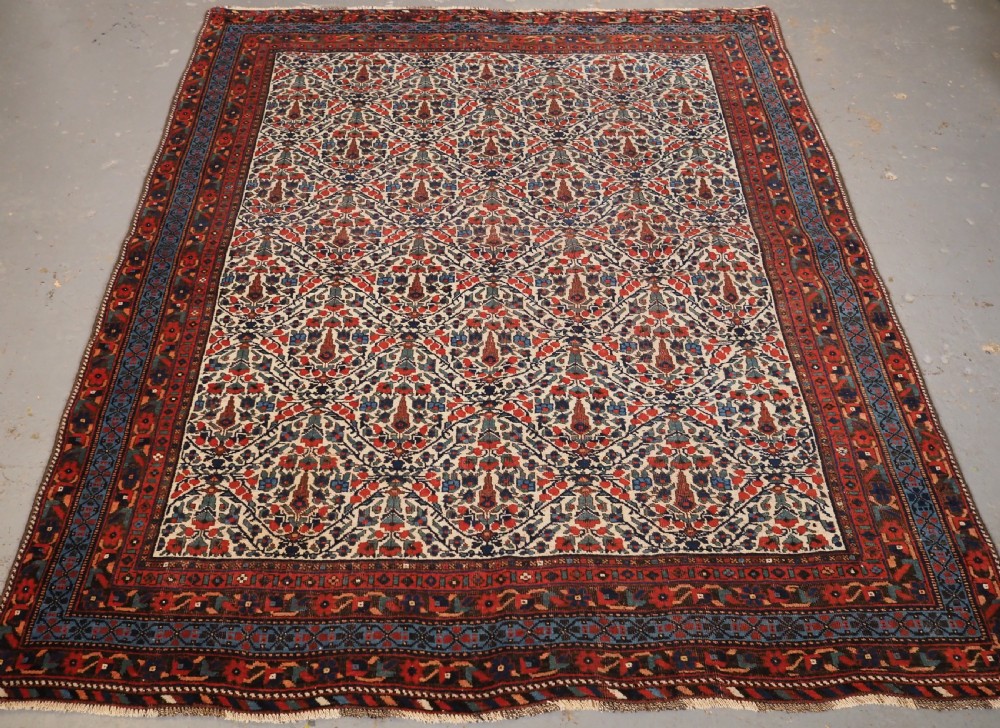 ANTIQUE AFSHAR NERIZ RUG WITH REPEAT CYPRESS TREE DESIGN, CIRCA 1900.