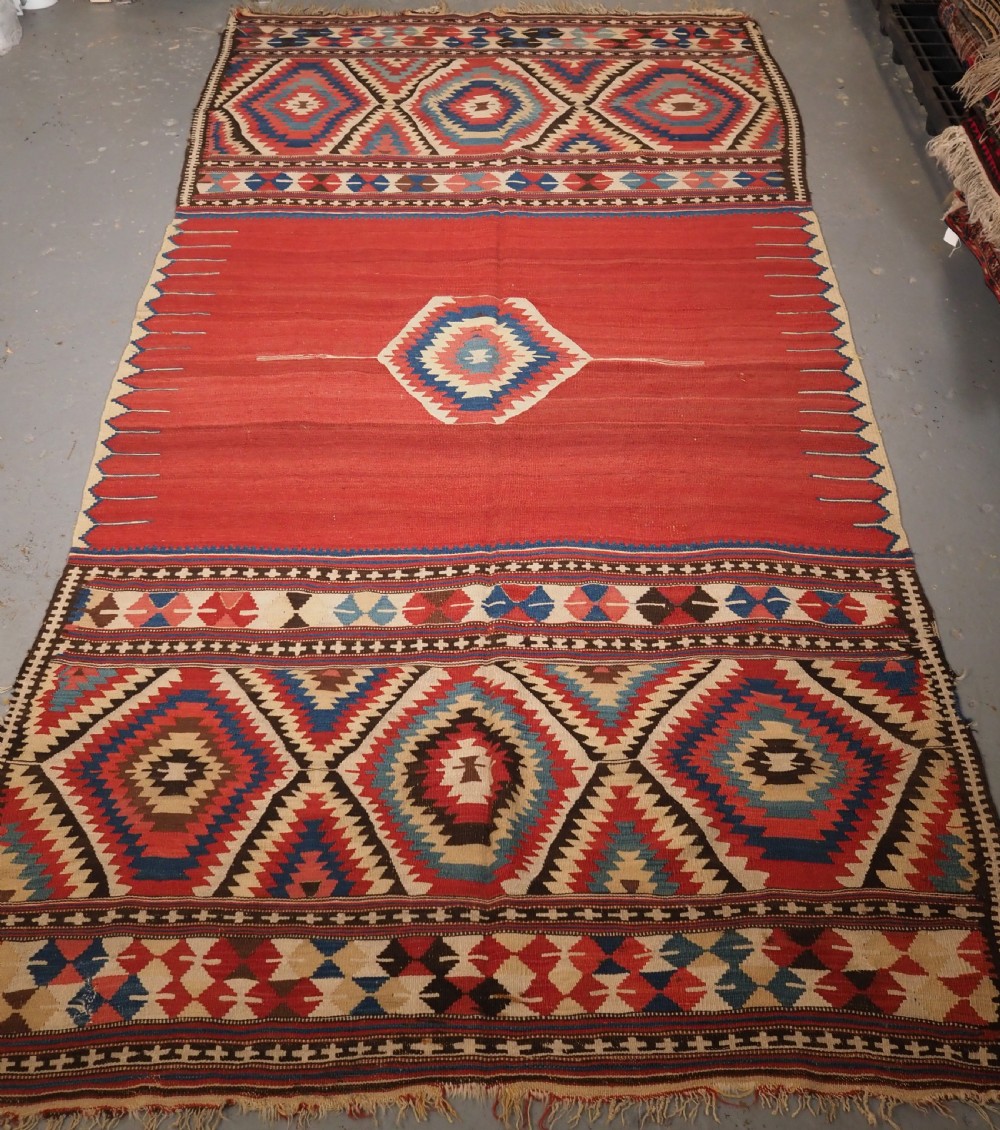 ANTIQUE TURKISH FETHIYE KILIM CAMEL COVER, CIRCA 1870.