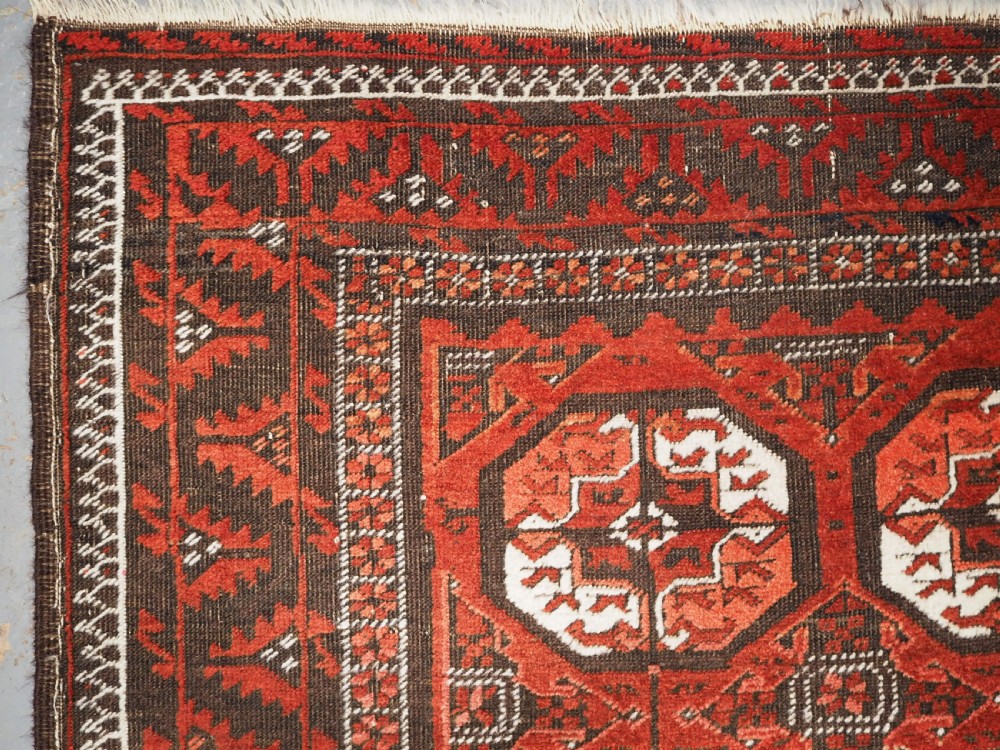 ANTIQUE MAHDAD KHANI BALUCH RUG, LARGE TURKMEN GULS, CIRCA 1900. View VIII