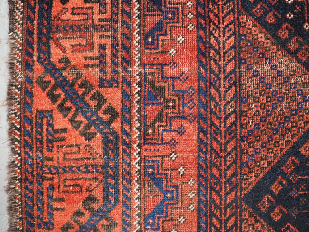 ANTIQUE FERDOWS BALUCH RUG OF SCARCE DESIGN, CIRCA 1900. View VI