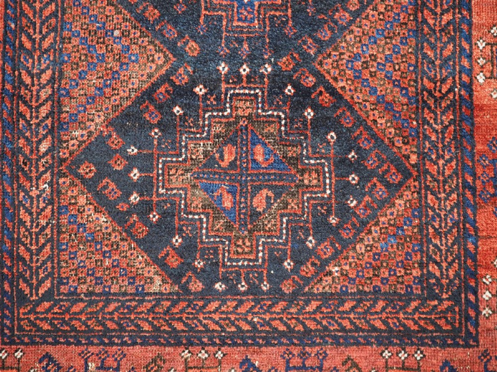 ANTIQUE FERDOWS BALUCH RUG OF SCARCE DESIGN, CIRCA 1900. View X
