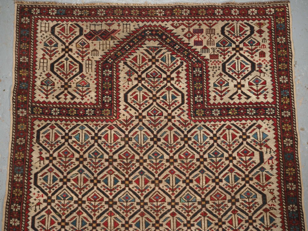 ANTIQUE CAUCASIAN DAGHESTAN PRAYER RUG, IVORY GROUND LATTICE, CIRCA 1880. View II