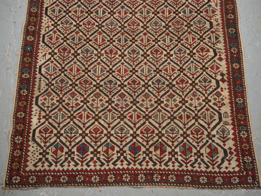 ANTIQUE CAUCASIAN DAGHESTAN PRAYER RUG, IVORY GROUND LATTICE, CIRCA 1880. View IV
