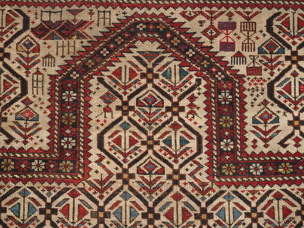 ANTIQUE CAUCASIAN DAGHESTAN PRAYER RUG, IVORY GROUND LATTICE, CIRCA 1880. View VI