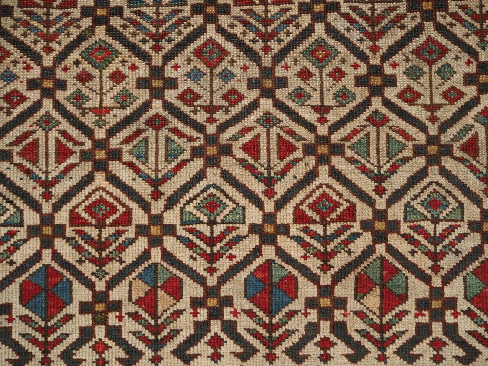 ANTIQUE CAUCASIAN DAGHESTAN PRAYER RUG, IVORY GROUND LATTICE, CIRCA 1880. View IX