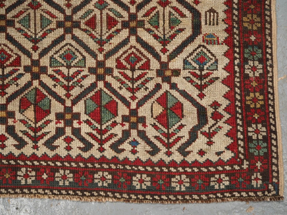ANTIQUE CAUCASIAN DAGHESTAN PRAYER RUG, IVORY GROUND LATTICE, CIRCA 1880. View X