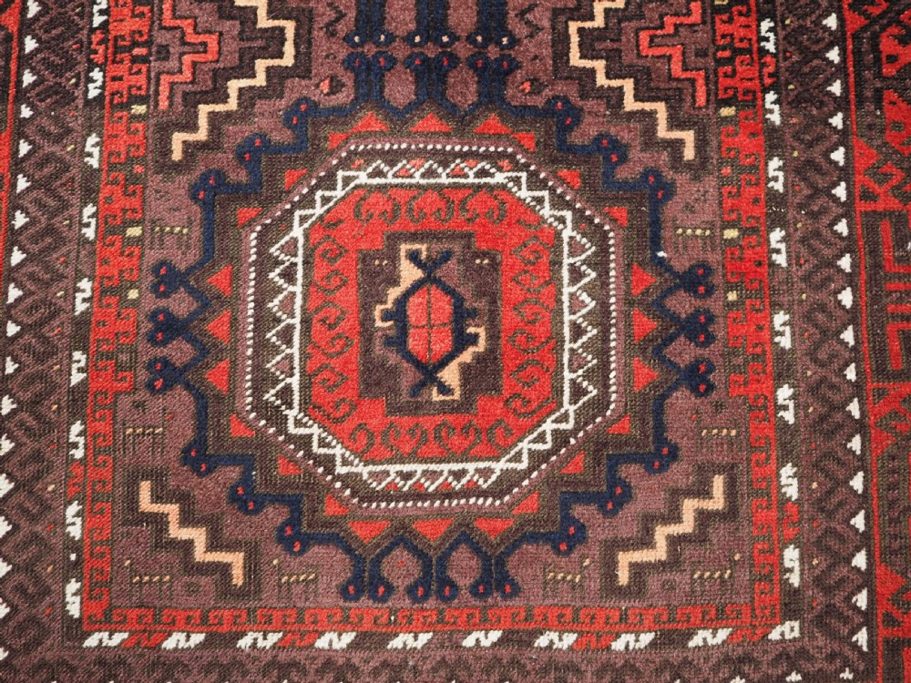 ANTIQUE BALUCH RUG, SALAR KHANI TRIBE, CIRCA 1900. View X