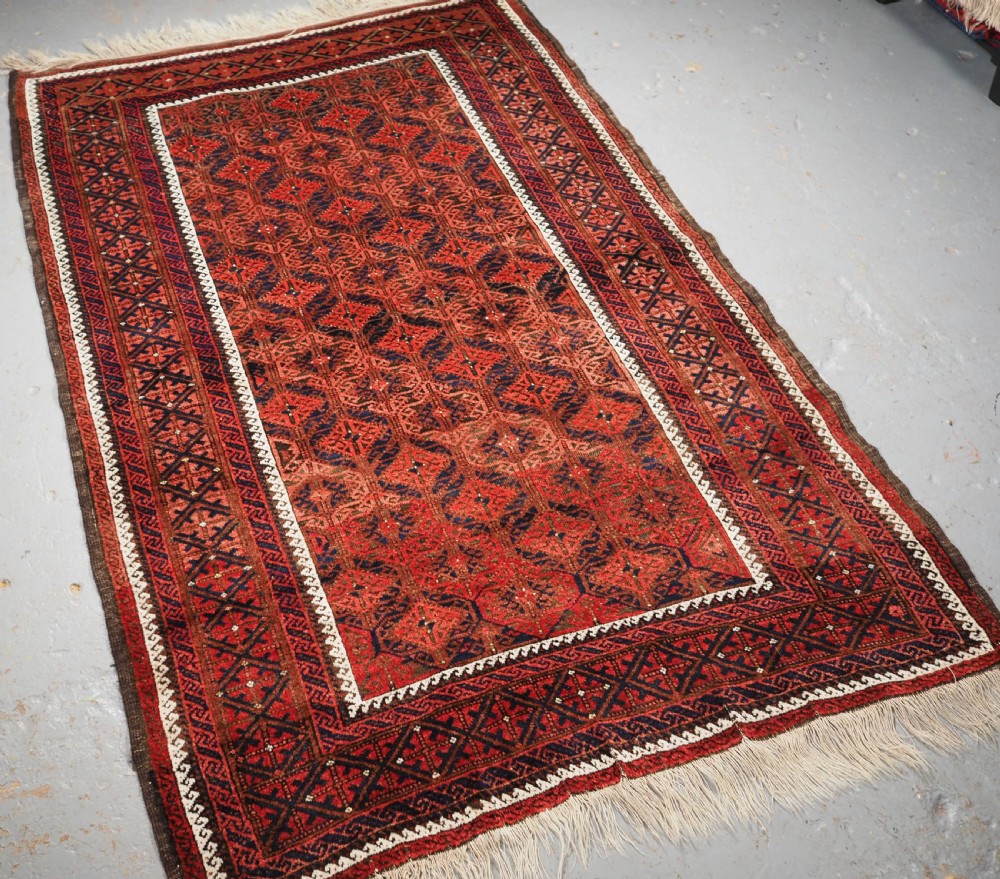 ANTIQUE BALUCH RUG WITH LATTICE DESIGN, SUPERB RUG, CIRCA 1880. View II