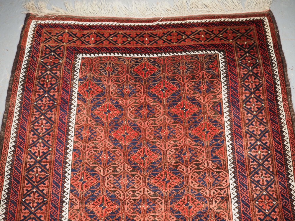 ANTIQUE BALUCH RUG WITH LATTICE DESIGN, SUPERB RUG, CIRCA 1880. View III