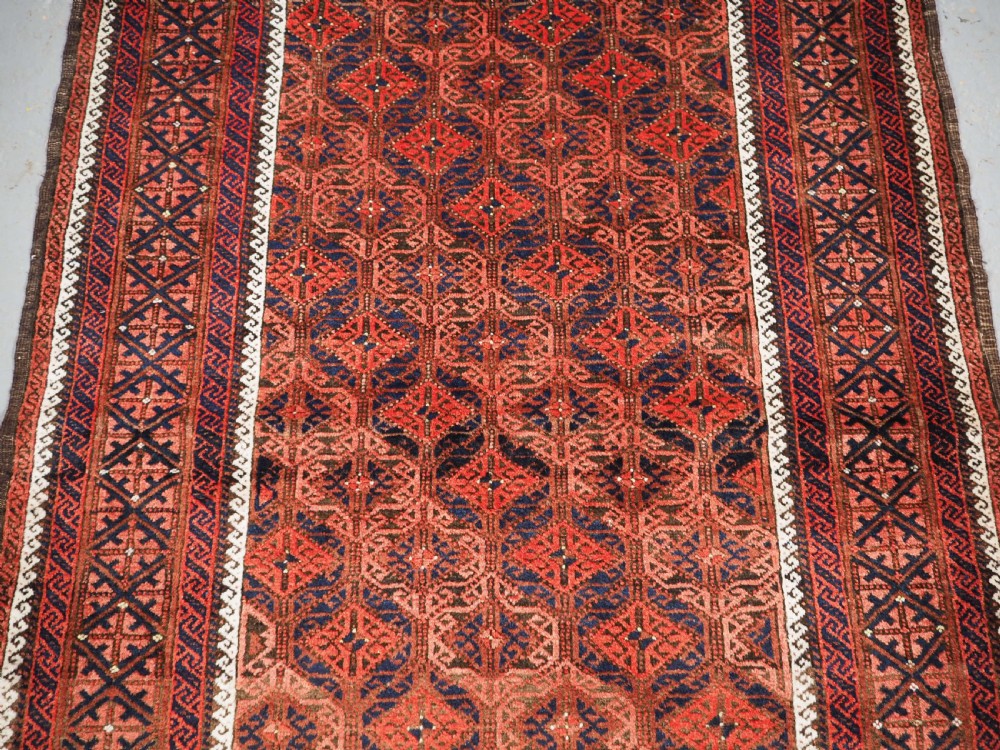 ANTIQUE BALUCH RUG WITH LATTICE DESIGN, SUPERB RUG, CIRCA 1880. View IV
