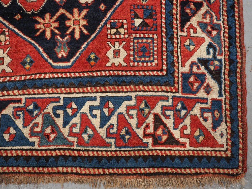 ANTIQUE CAUCASIAN CLOUDBAND CHONDZORESK KAZAK LONG RUG, CIRCA 1890. View X