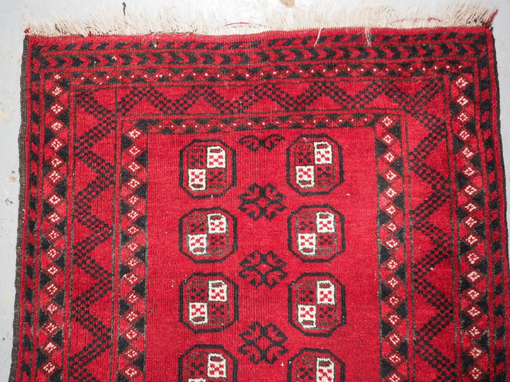 OLD AFGHAN VILLAGE RUG OF SMALL MAT SIZE, CIRCA 1930. View II