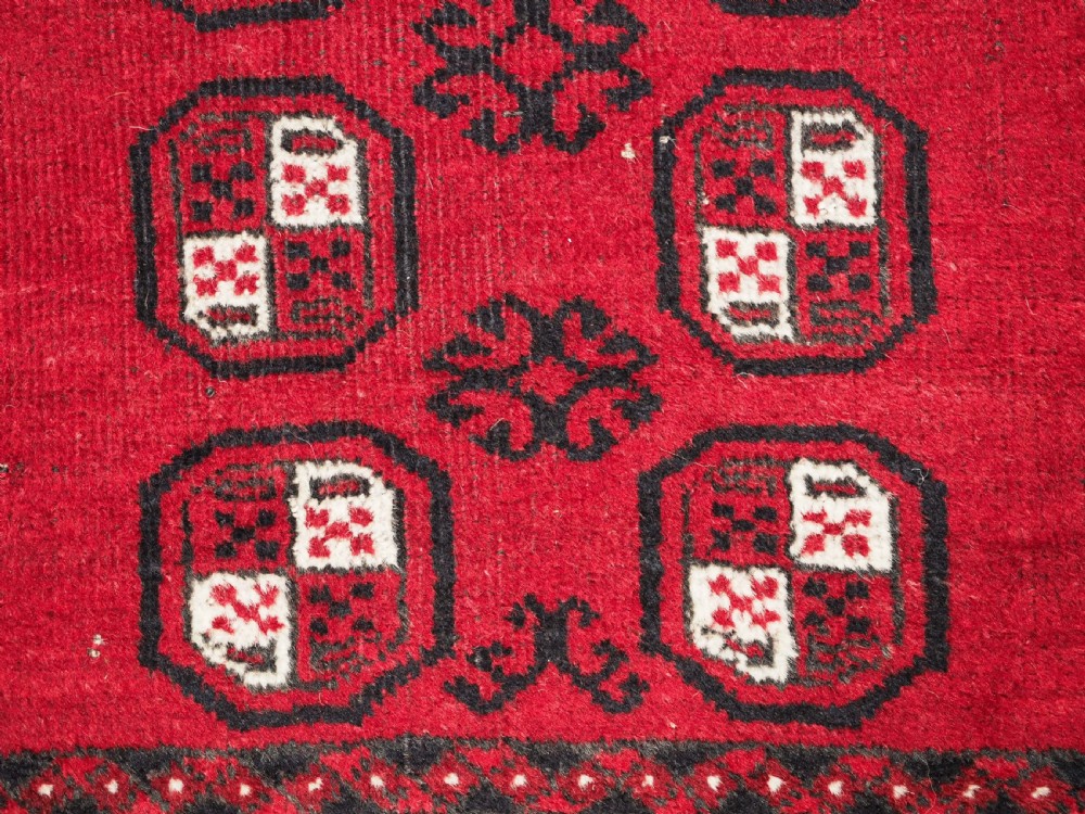 OLD AFGHAN VILLAGE RUG OF SMALL MAT SIZE, CIRCA 1930. View III