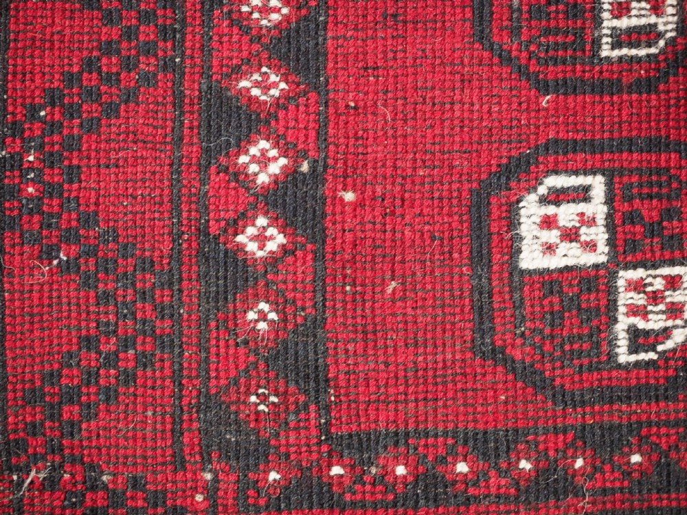 OLD AFGHAN VILLAGE RUG OF SMALL MAT SIZE, CIRCA 1930. View IV
