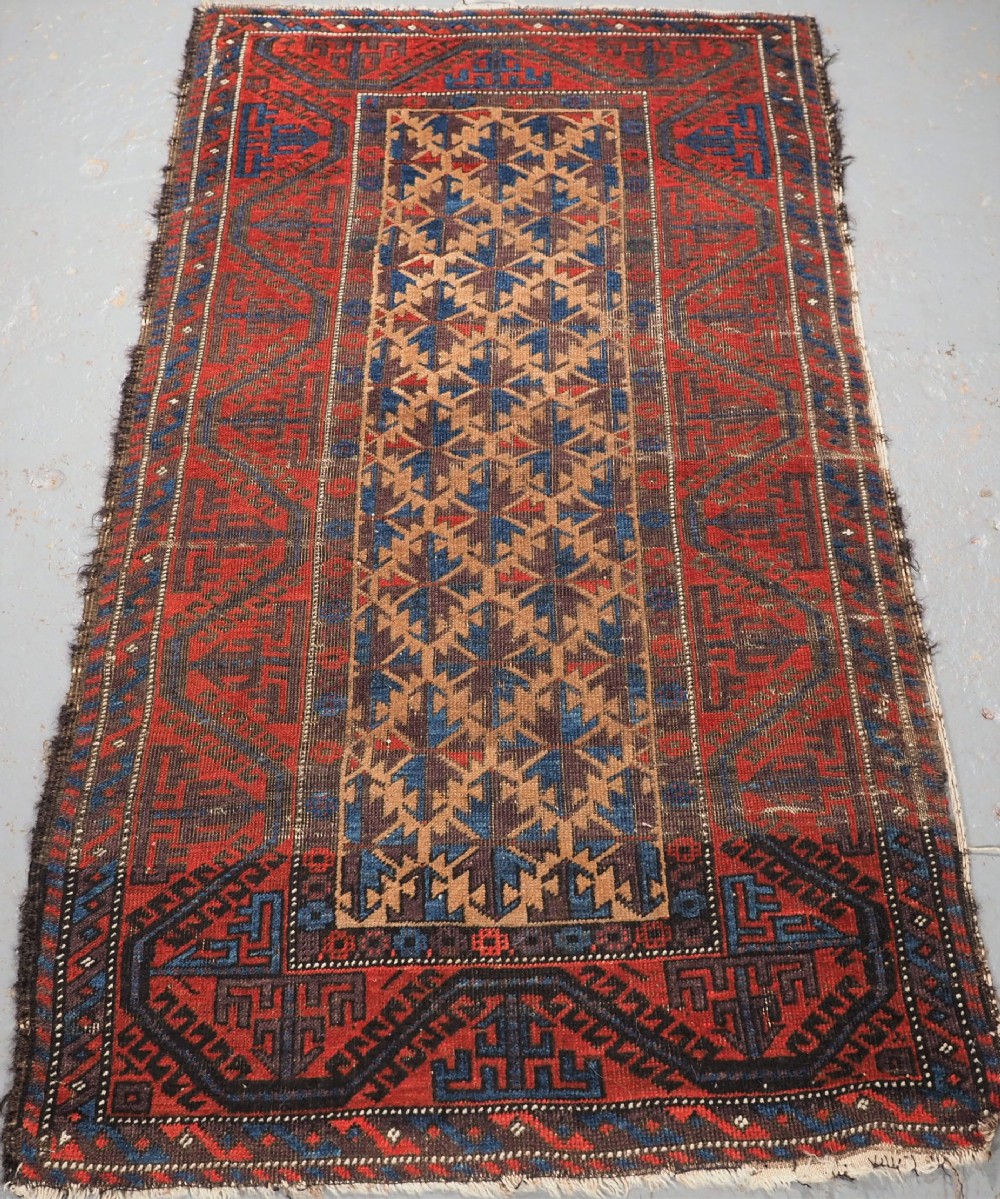 ANTIQUE TRIBAL BALUCH RUG WITH SUPERB COLOUR, CIRCA 1880.