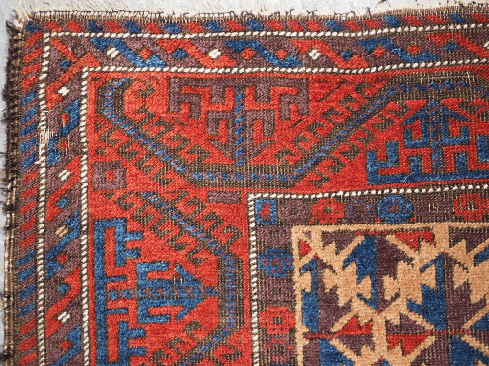 ANTIQUE TRIBAL BALUCH RUG WITH SUPERB COLOUR, CIRCA 1880. View V
