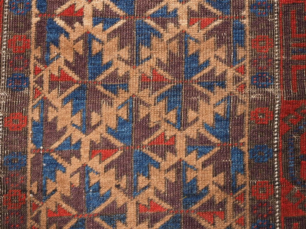 ANTIQUE TRIBAL BALUCH RUG WITH SUPERB COLOUR, CIRCA 1880. View VIII
