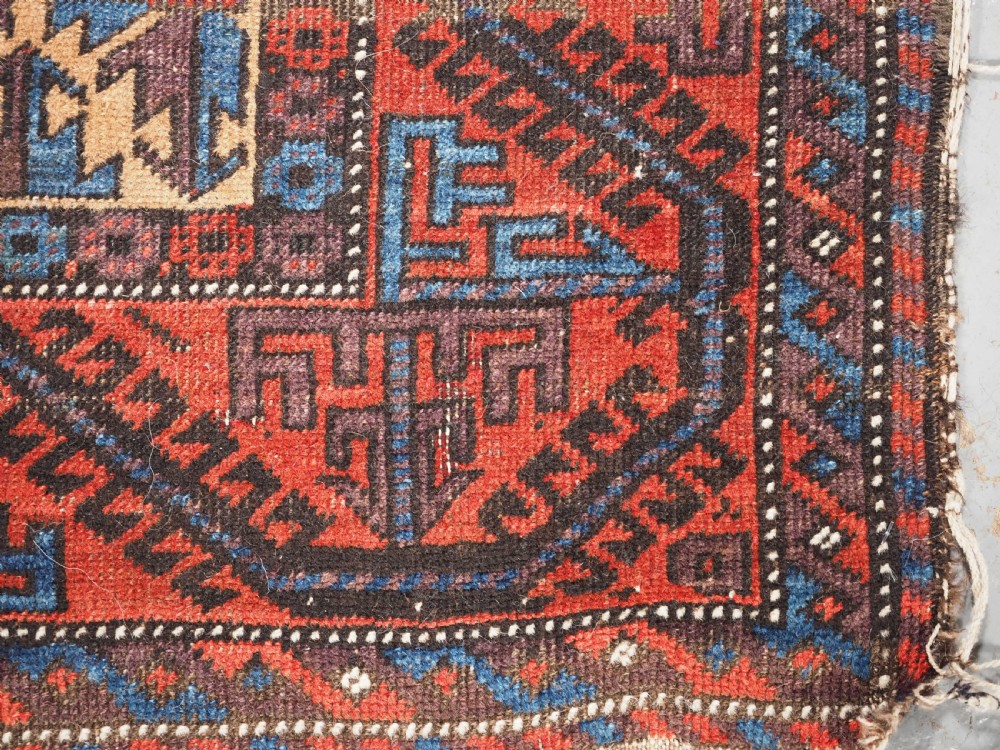 ANTIQUE TRIBAL BALUCH RUG WITH SUPERB COLOUR, CIRCA 1880. View X