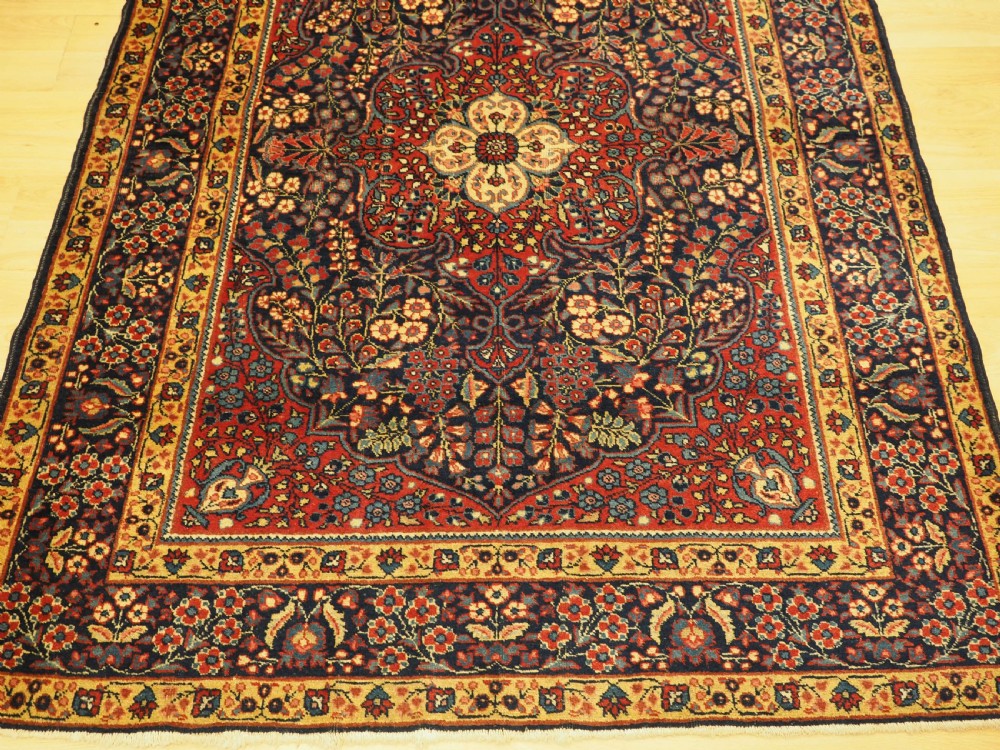 ANTIQUE TABRIZ RUG OF CLASSIC FLORAL DESIGN, CIRCA 1920. View V