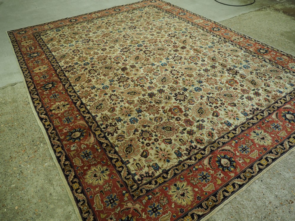 ANTIQUE TABRIZ CARPET, IVORY GROUND WITH SOFT PASTEL COLOURS, CIRCA 1920. View II