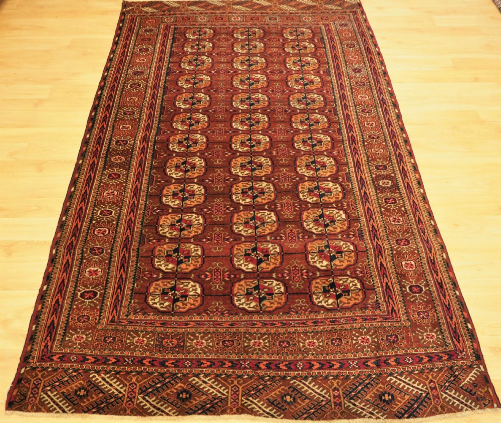 ANTIQUE TEKKE TURKMEN RUG, EXCELLENT CONDITION, CIRCA 1900.
