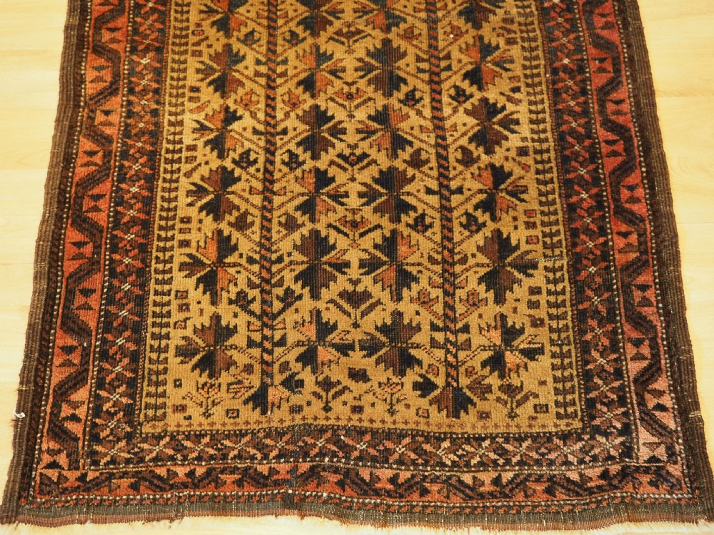 ANTIQUE BALUCH PRAYER RUG WITH TREE OF LIFE DESIGN ON A CAMEL GROUND, CIRCA 1900. View V