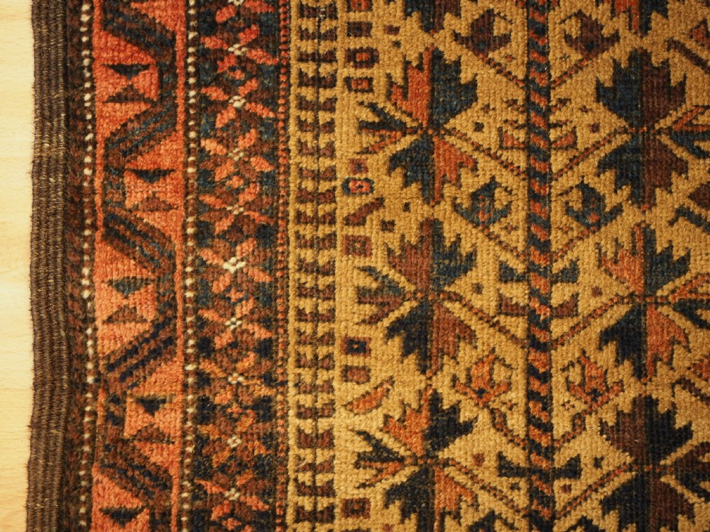 ANTIQUE BALUCH PRAYER RUG WITH TREE OF LIFE DESIGN ON A CAMEL GROUND, CIRCA 1900. View VII