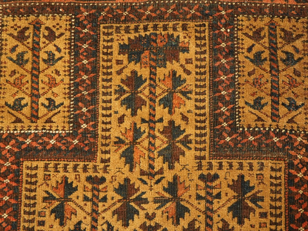 ANTIQUE BALUCH PRAYER RUG WITH TREE OF LIFE DESIGN ON A CAMEL GROUND, CIRCA 1900. View VIII