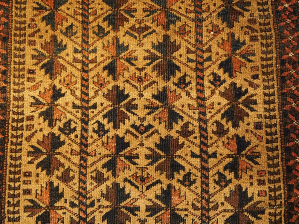 ANTIQUE BALUCH PRAYER RUG WITH TREE OF LIFE DESIGN ON A CAMEL GROUND, CIRCA 1900. View IX