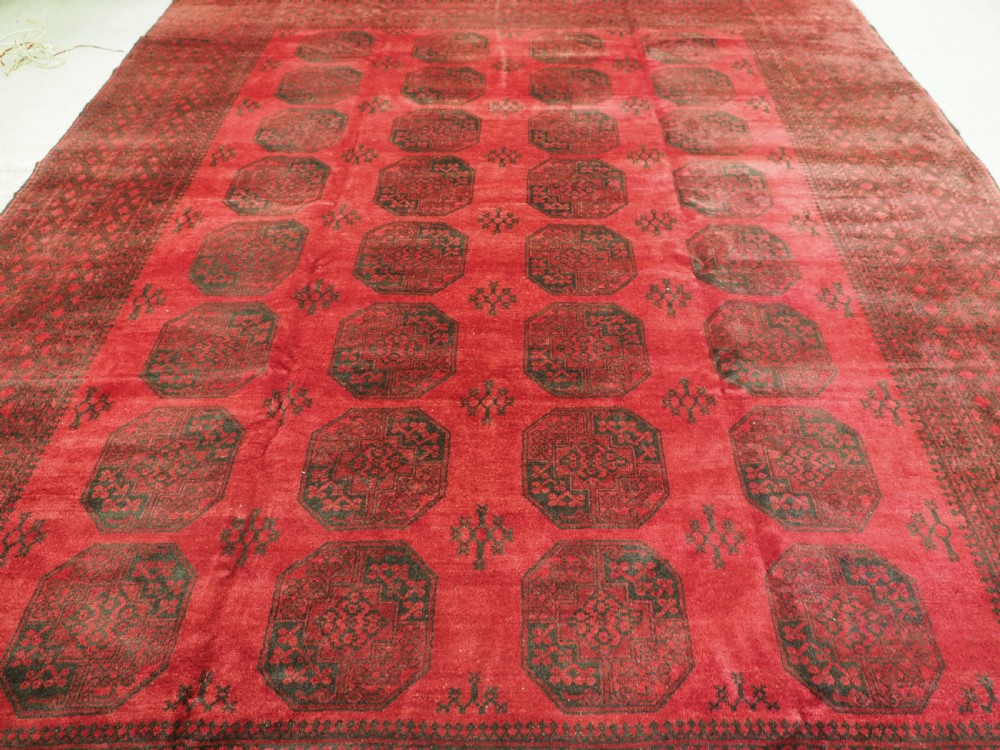 OLD AFGHAN VILLAGE CARPET, LARGE ROOM SIZE, CIRCA 1930. View IV