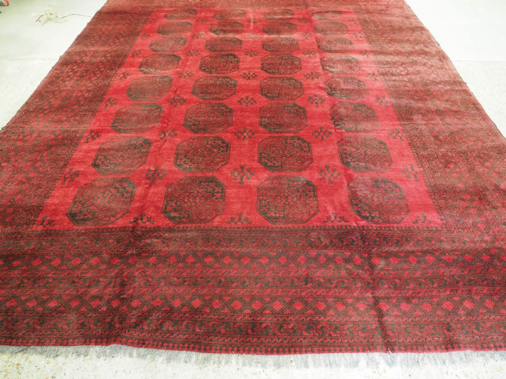 OLD AFGHAN VILLAGE CARPET, LARGE ROOM SIZE, CIRCA 1930. View VI