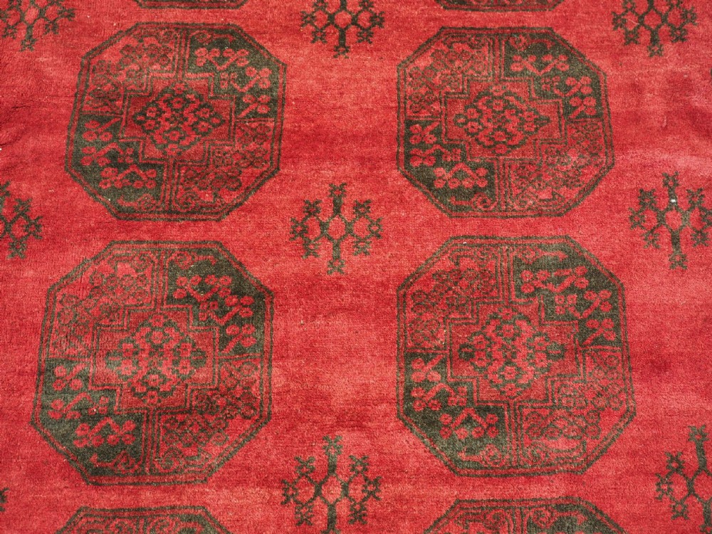 OLD AFGHAN VILLAGE CARPET, LARGE ROOM SIZE, CIRCA 1930. View VIII