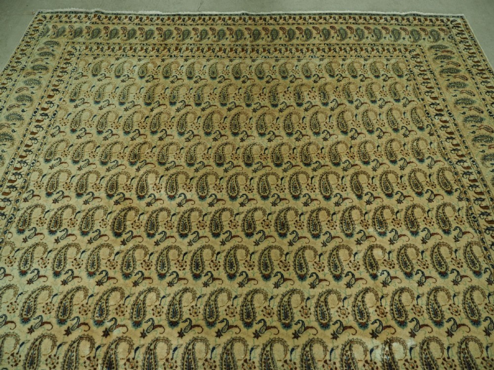 ANTIQUE KASHAN CARPET, IVORY GROUND WITH ALL OVER BOTEH DESIGN, CIRCA 1920. View III