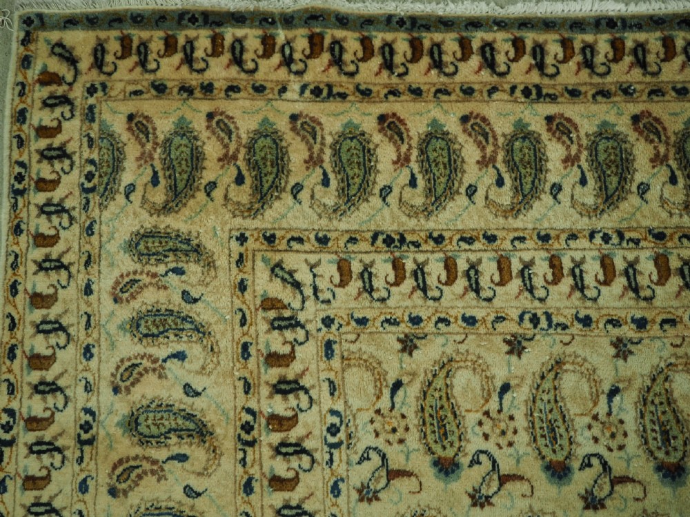 ANTIQUE KASHAN CARPET, IVORY GROUND WITH ALL OVER BOTEH DESIGN, CIRCA 1920. View VI