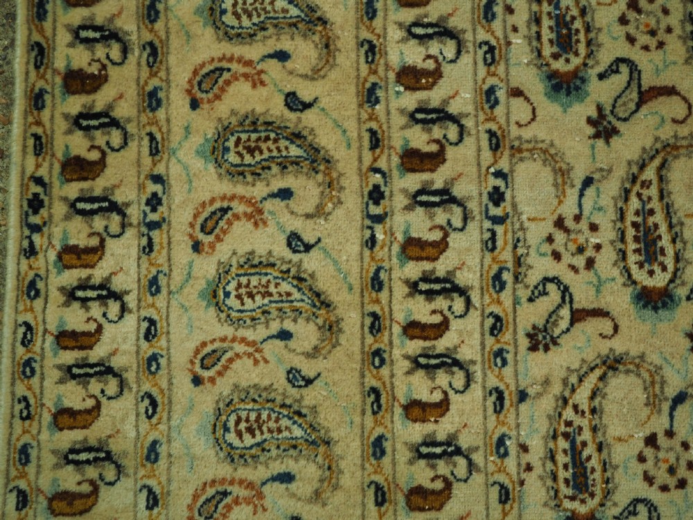 ANTIQUE KASHAN CARPET, IVORY GROUND WITH ALL OVER BOTEH DESIGN, CIRCA 1920. View VII