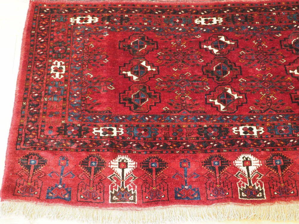 ANTIQUE ERSARI TURKMEN 9 GUL CHUVAL, PROBABLY KIZIL AYAK, CIRCA 1900. View II