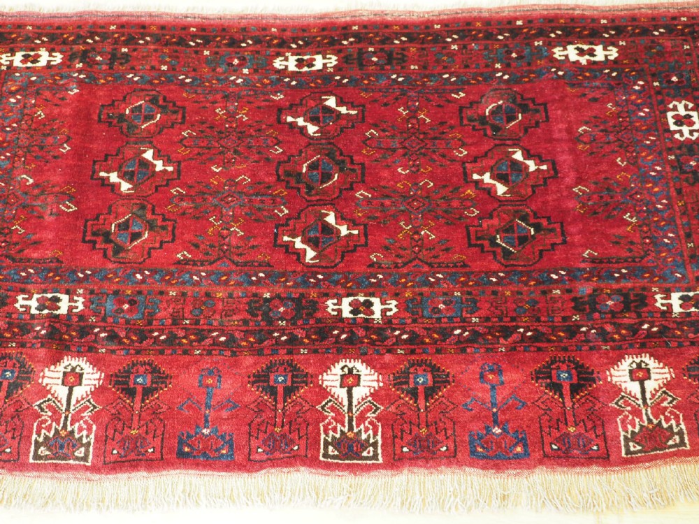 ANTIQUE ERSARI TURKMEN 9 GUL CHUVAL, PROBABLY KIZIL AYAK, CIRCA 1900. View III