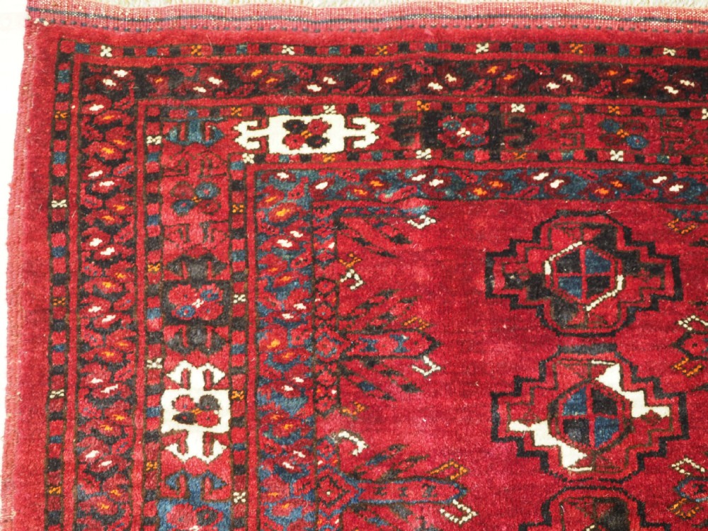 ANTIQUE ERSARI TURKMEN 9 GUL CHUVAL, PROBABLY KIZIL AYAK, CIRCA 1900. View V