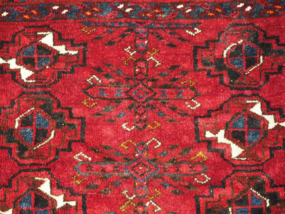 ANTIQUE ERSARI TURKMEN 9 GUL CHUVAL, PROBABLY KIZIL AYAK, CIRCA 1900. View X