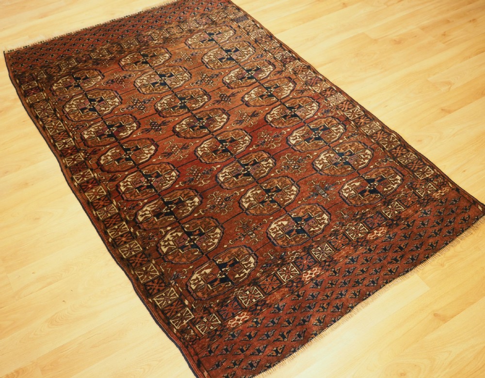 ANTIQUE TEKKE TURKMEN 'DIP KHALI' RUG, LARGE GULS, GOOD COLOUR, CIRCA 1890. View II
