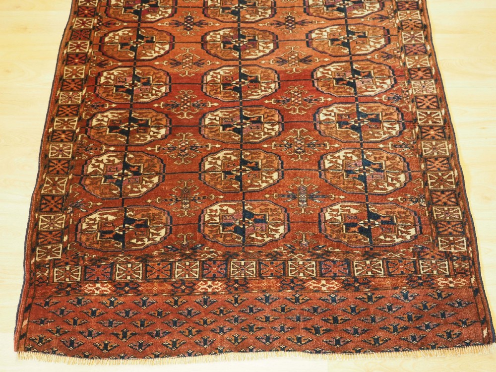 ANTIQUE TEKKE TURKMEN 'DIP KHALI' RUG, LARGE GULS, GOOD COLOUR, CIRCA 1890. View V